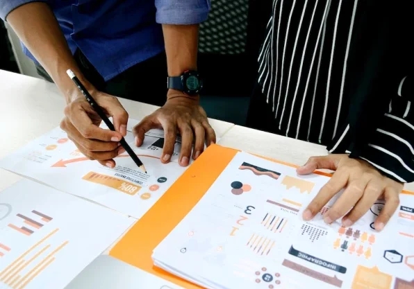 People working with charts People working with charts